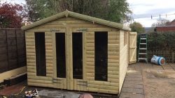 16 x 10ft Tanalised Wooden Summerhouse Shed 19mm Finished Log Lap Gabled Roof Shape